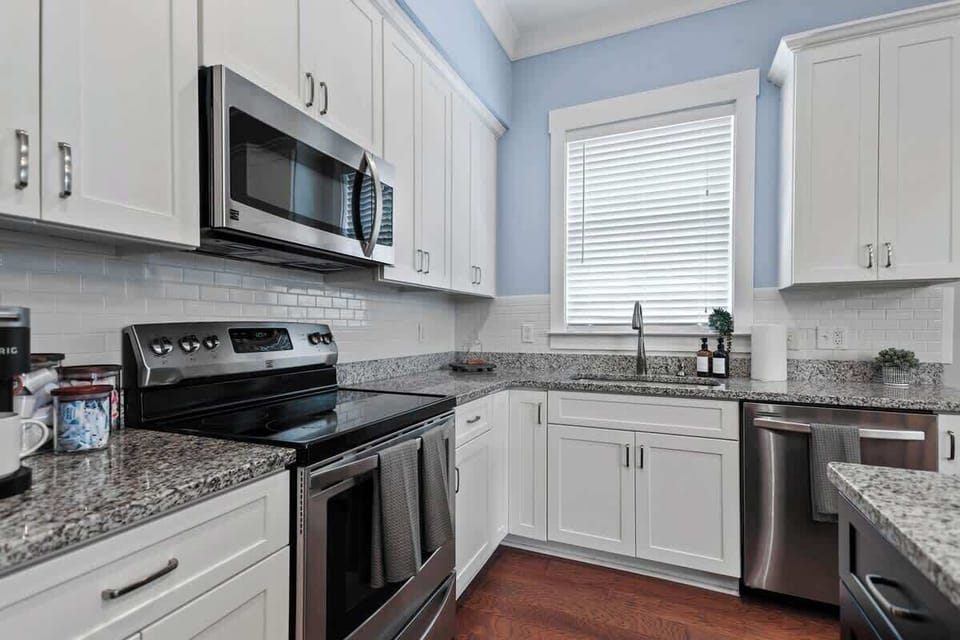 Neutral tones in the kitchen provide all the essentials, amid colorful decor.
