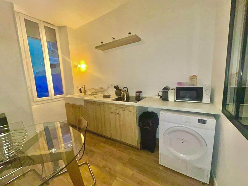 Kitchen, dining table, washing machine, micro wave