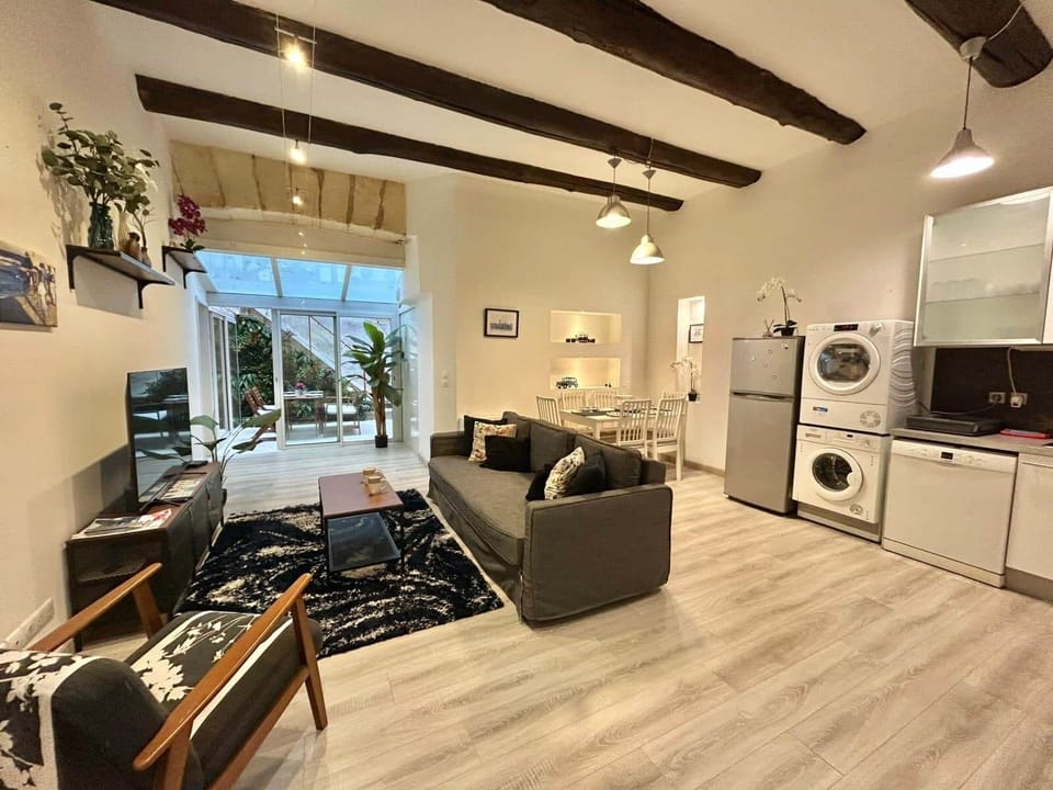 Living room, TV area and dining table