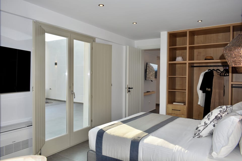 Family Villa, Private Pool, Sea View | Minibar, in-room safe, soundproofing, iron/ironing board