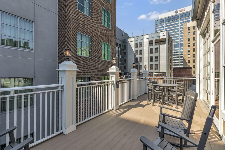 Guests staying in 603 will have access to communal balcony over Printers Aly!