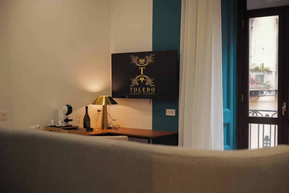 Deluxe Room, Balcony, City View | In-room safe, desk, blackout drapes, soundproofing