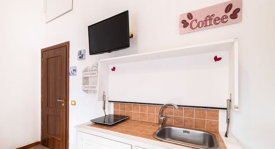Deluxe Quadruple Room, Balcony, City View | Soundproofing, free WiFi