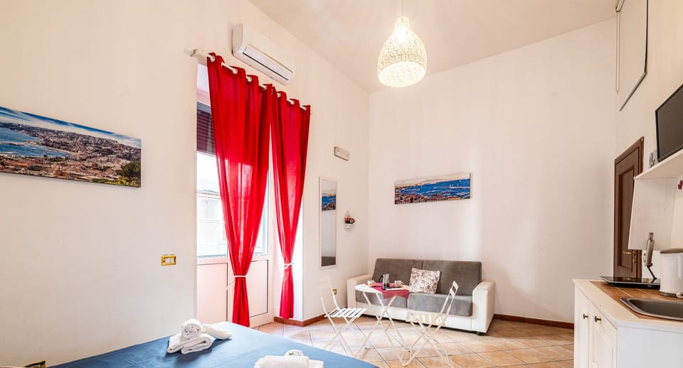 Deluxe Quadruple Room, Balcony, City View | Soundproofing, free WiFi