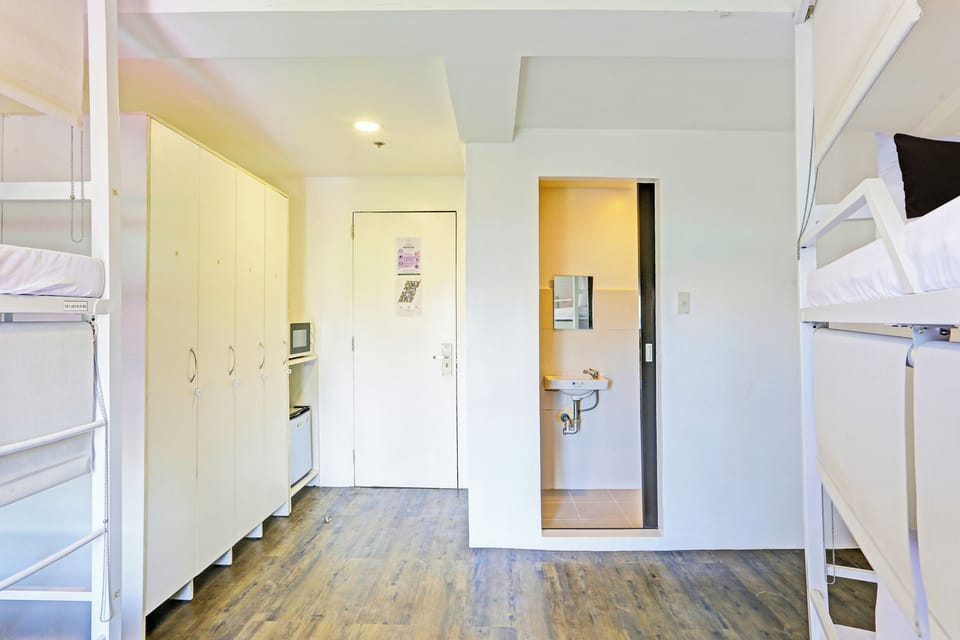 Premium bedding, desk, laptop workspace, free WiFi