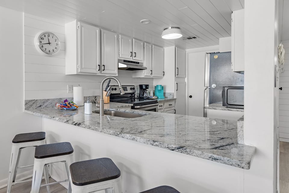 Cook delicious meals in the REMODELED Kitchen while overlooking the Gulf of Mexico
