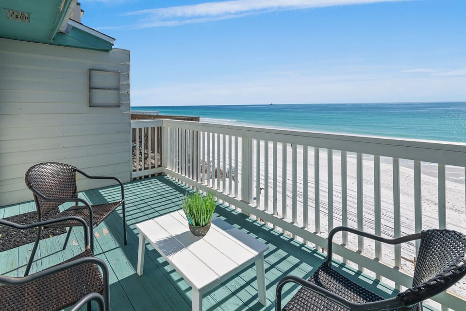 SPACIOUS Master Bedroom features BIG Gulf Views off of the 3rd Floor Private Balcony