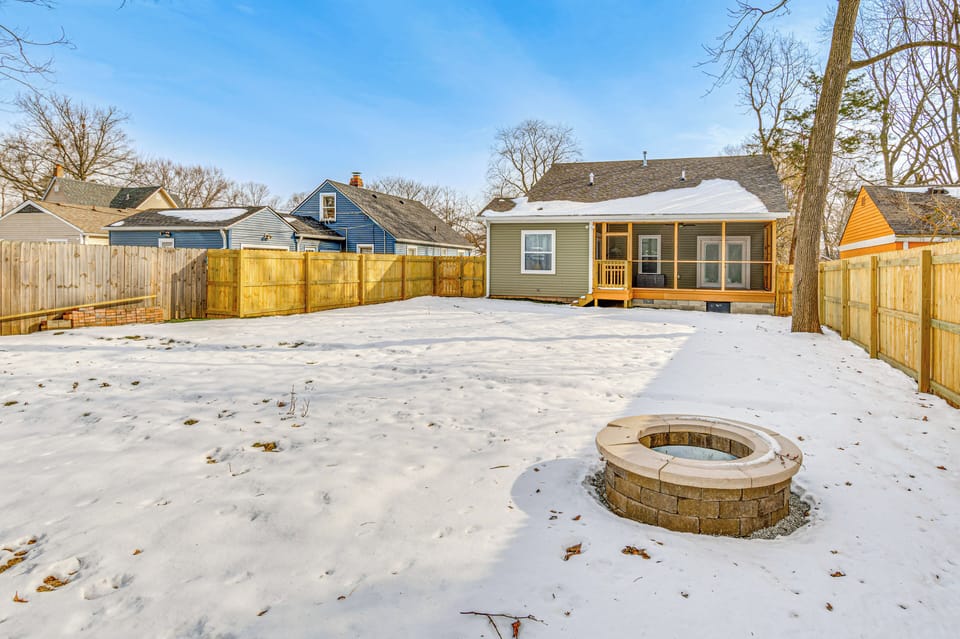 Cottage Exterior | Fenced Backyard | Fire Pit