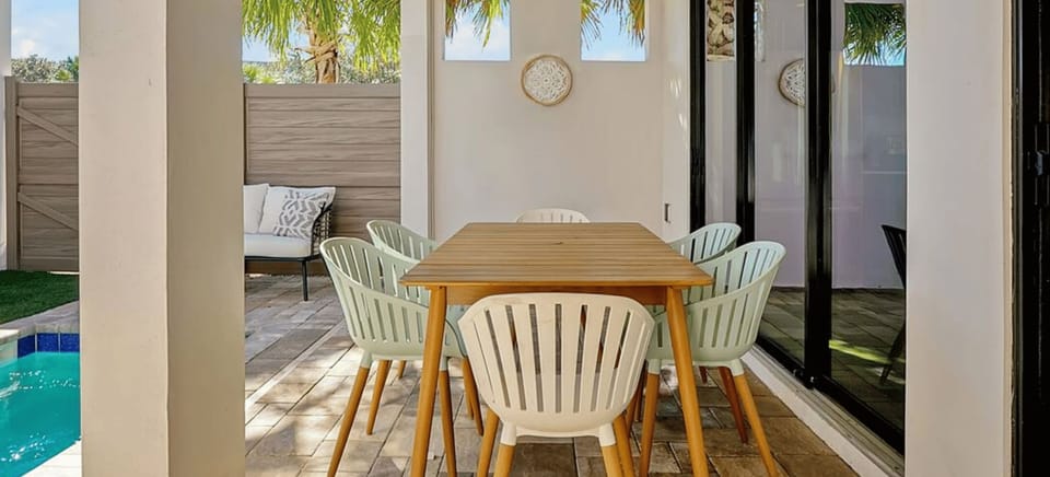 The patio offers a charming outdoor space, perfect for enjoying meals, relaxing, or entertaining guests.