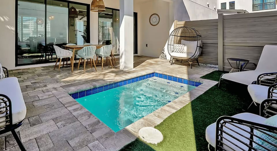 Enjoy your own private oasis with a pool designed for both relaxation and recreation, just steps from your door.