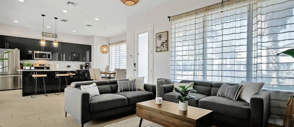 The open floor plan creates a spacious and inviting atmosphere, perfect for both relaxation and entertaining.