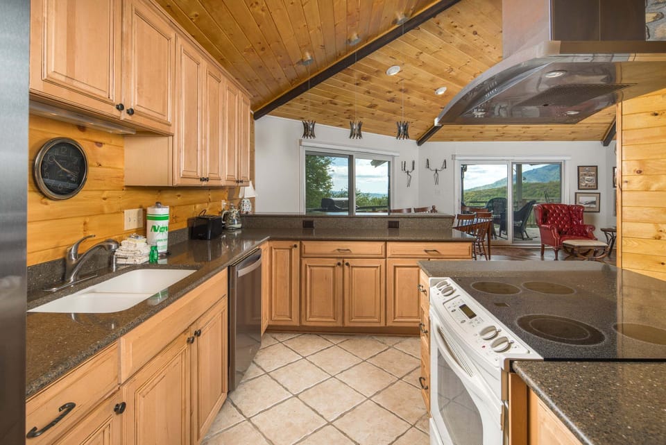Fully equipped kitchen with ample counter space and open-concept design