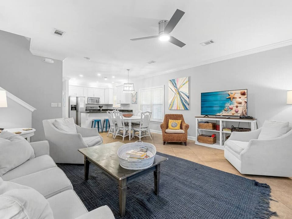 Open Living Room Space with Smart TV and spacious dining and seating area
