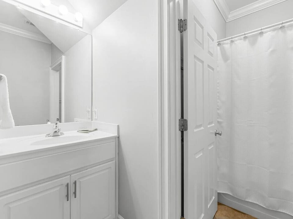 Full Shared Bathroom on the Main Living Area, includes tub, shower, and toilet