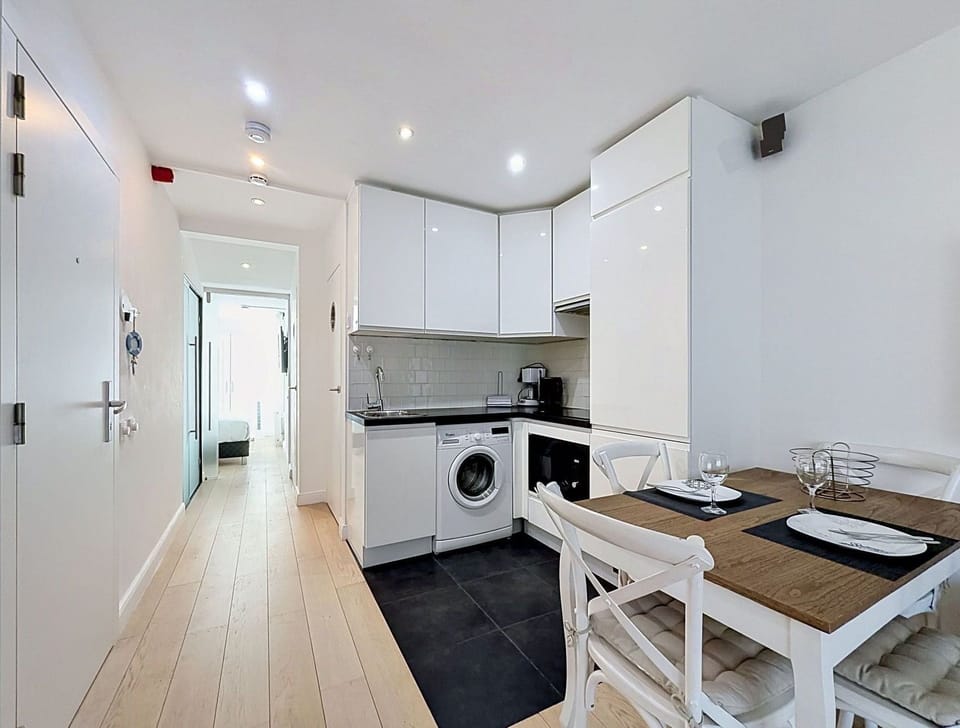Flooring, Interior Design, Floor, Major Appliance, Ceiling, Furniture, Kitchen, Kitchen Appliance, Room, Home Appliance