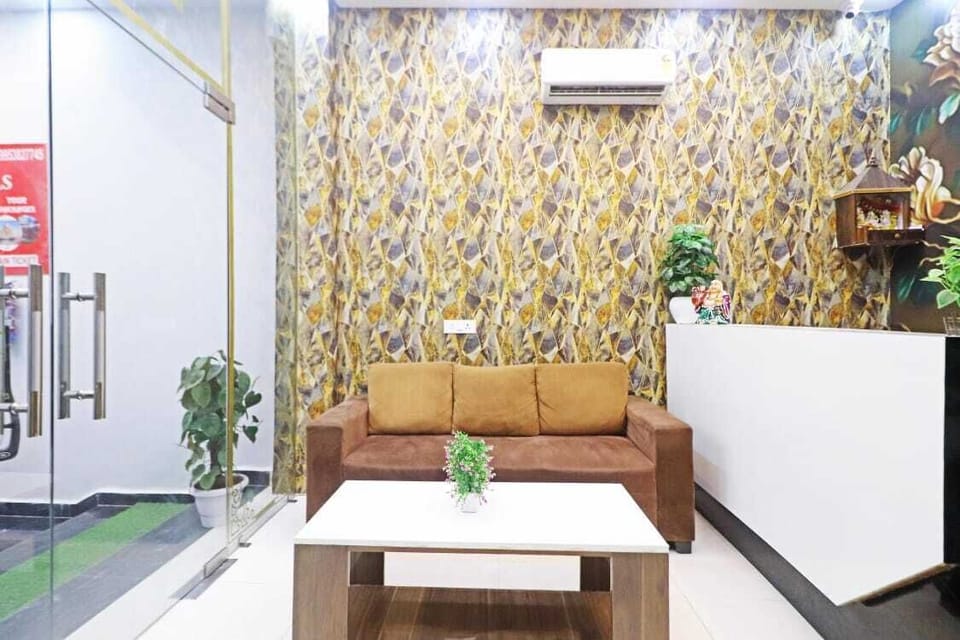 Deluxe Double Room, Balcony, City View | Living area | TV