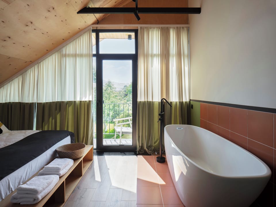 Deluxe Double Room, Garden View | Bathroom | Free toiletries, hair dryer, bathrobes, slippers