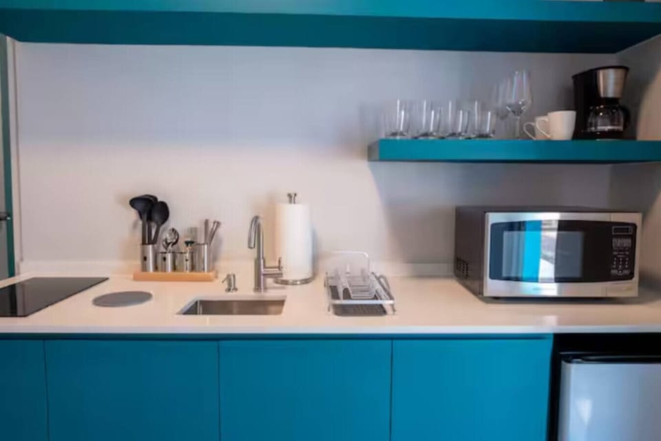 Experience a cozy well equipped kitchen that supports everything from quick snacks to full home cooked meals