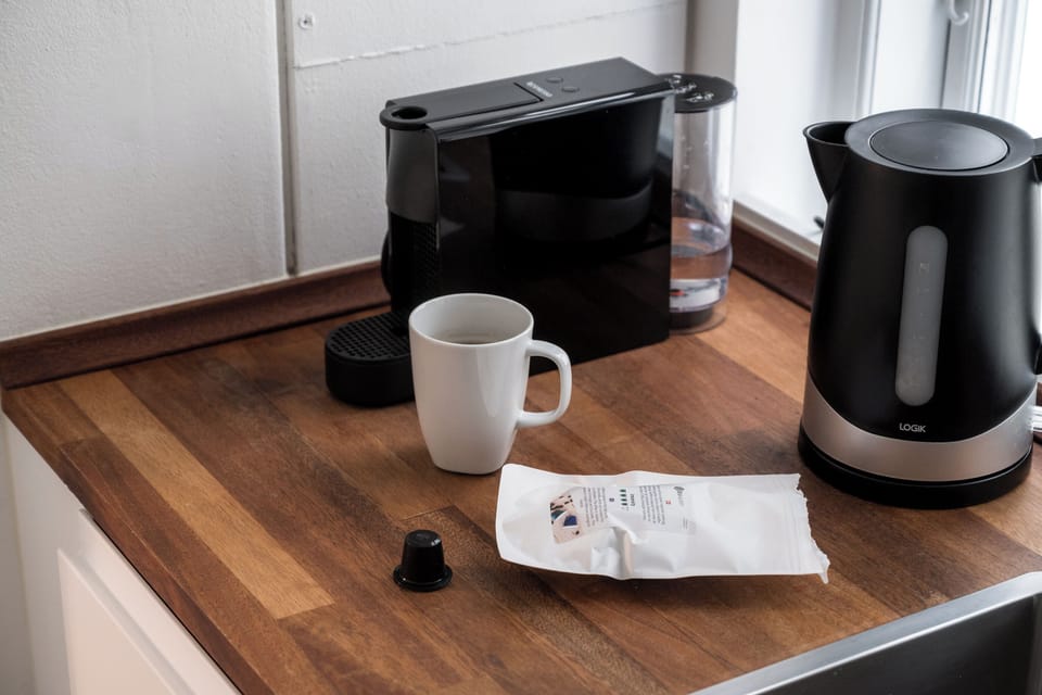 Comfort Penthouse, City View | Coffee and/or coffee maker