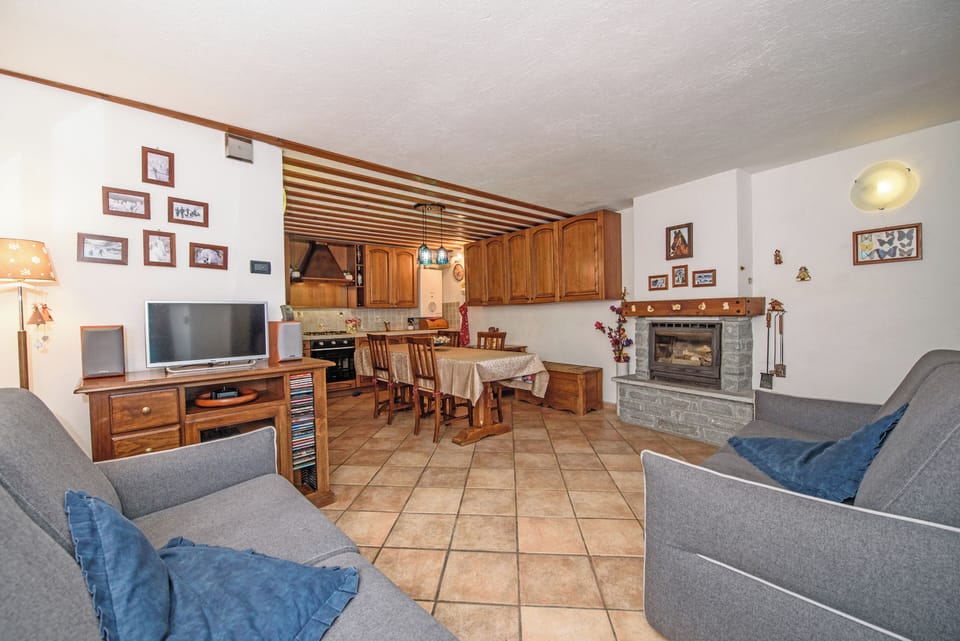 Apartment, Patio, Mountain View | Living area | 30-inch flat-screen TV with digital channels, fireplace