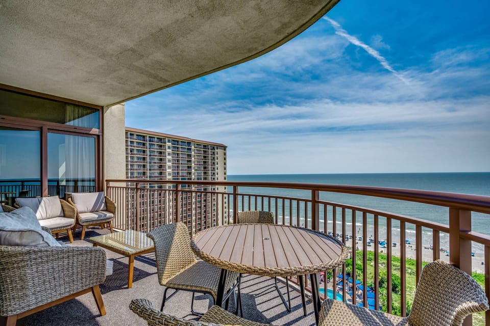 The main balcony can be accessed from the living room, Primary bedroom and Guest room 1.