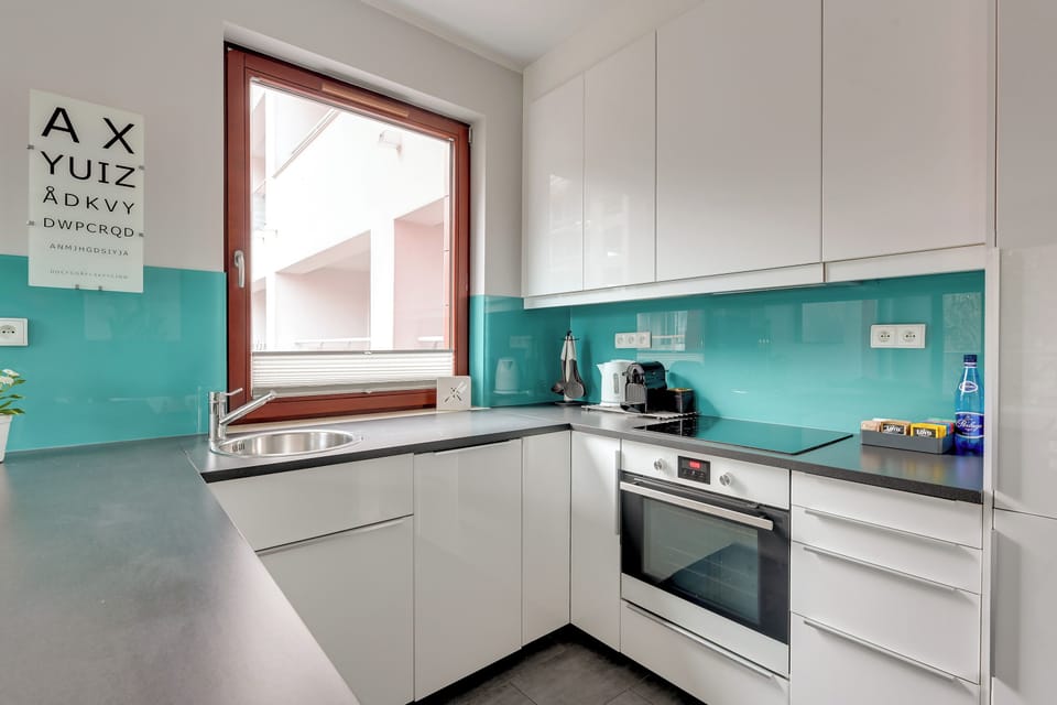 Comfort Apartment | Private kitchenette | Coffee/tea maker, electric kettle, highchair, griddle