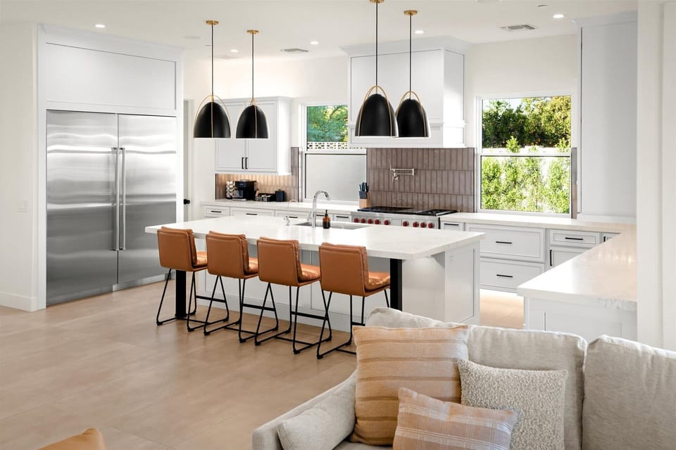 Modern kitchen and living space showcasing the open layout.
