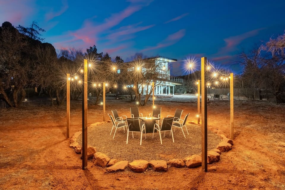 Shared fire pit lounge with seating for more than 8. Perfect for fireside chats and stargazing