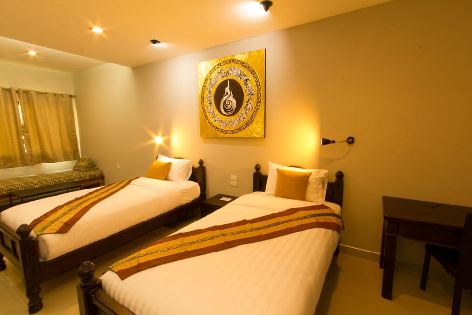 Superior Twin Room (Rise Twin Room) | Minibar, desk, soundproofing, iron/ironing board