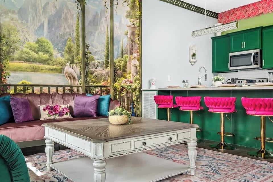 Insta-worthy main lounge with a unique wallpaper and decor that is sure to WOW! Comfortable seating for your entire group!