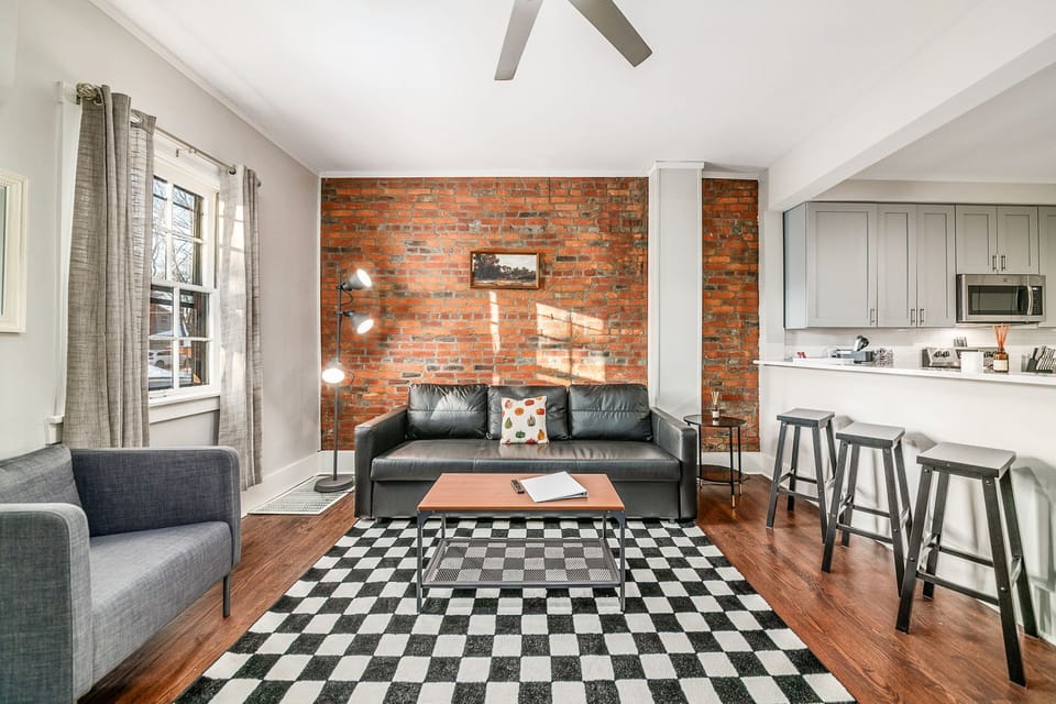 Living area features a sofa bed.
