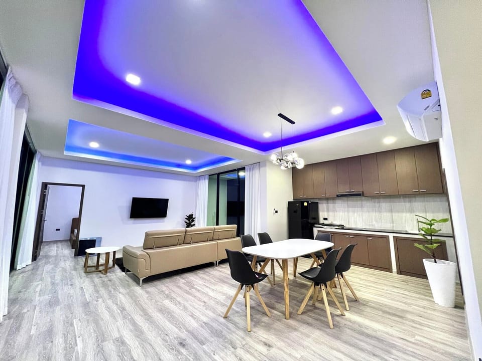 Villa | Living area | 32-inch flat-screen TV with cable channels