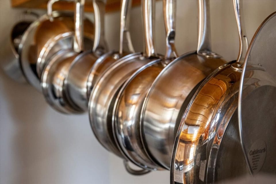 Bring your favorite recipes to life with this full set of professional-grade cookware hanging right at your fingertips.