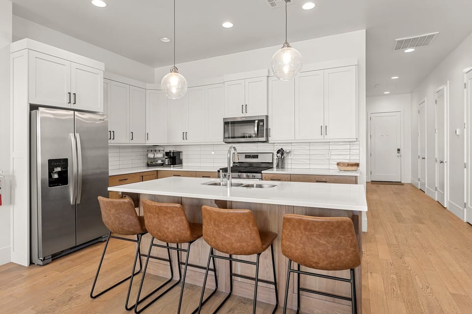 Townhome, 4 Bedrooms | Private kitchen | Coffee/tea maker, fridge, oven, stovetop