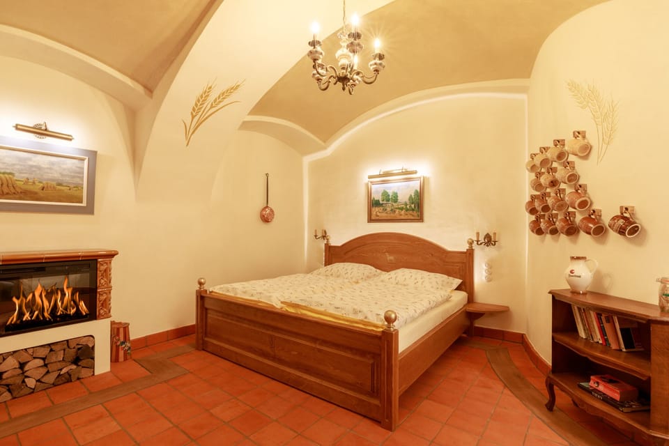 Comfort Double Room, Courtyard View, Ground Floor | Minibar, individually decorated, laptop workspace, blackout drapes