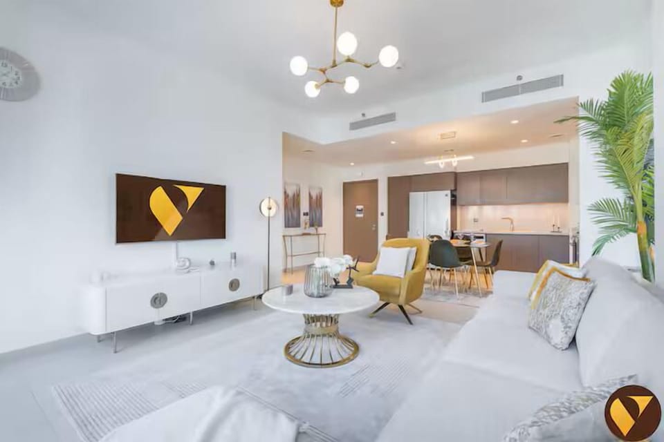 Luxury Apartment, City View | Living area | 55-inch Smart TV with cable channels