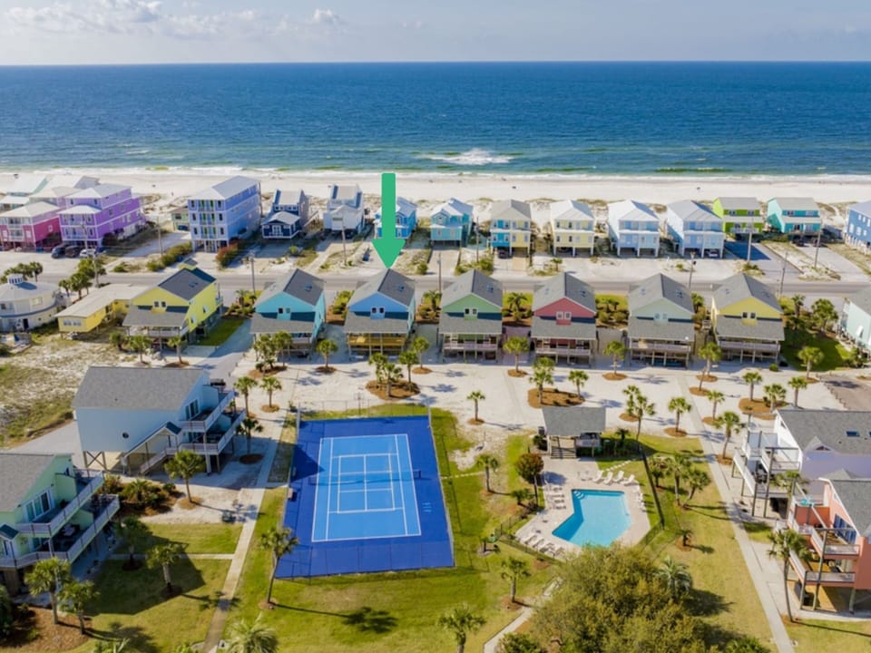 The Pleasure Isle community offers a beach boardwalk, pool, pickle ball, tennis and basketball court!