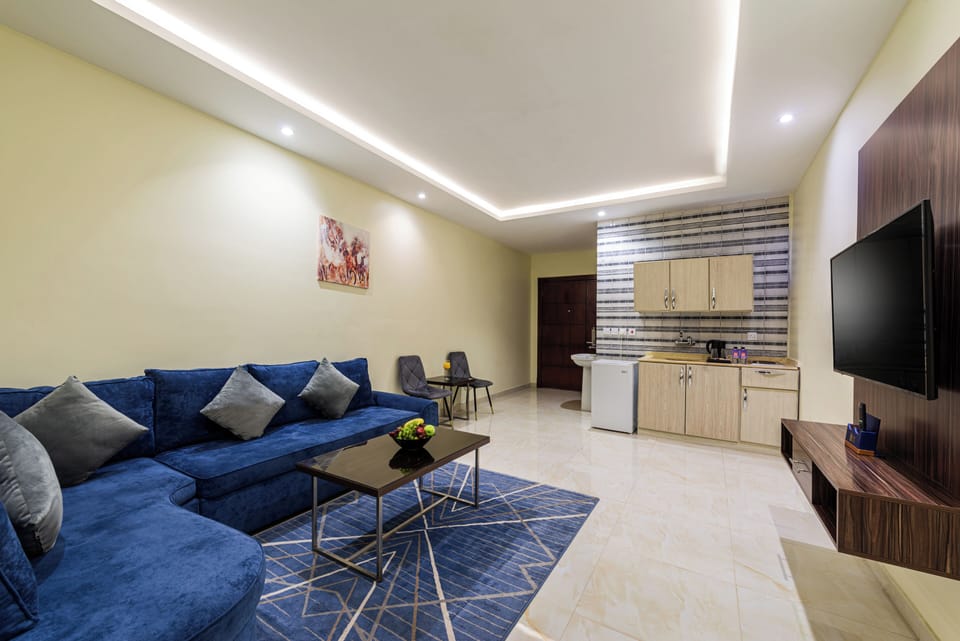 Junior Room | Living area | 50-inch flat-screen TV with digital channels