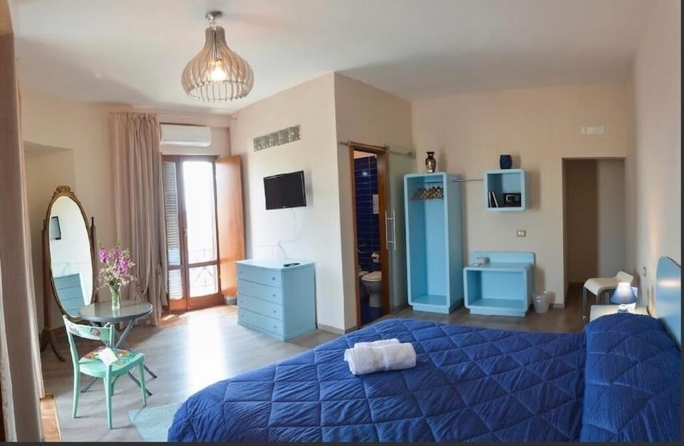 Panoramic Triple Room, Balcony, City View | Hypo-allergenic bedding, laptop workspace, blackout drapes