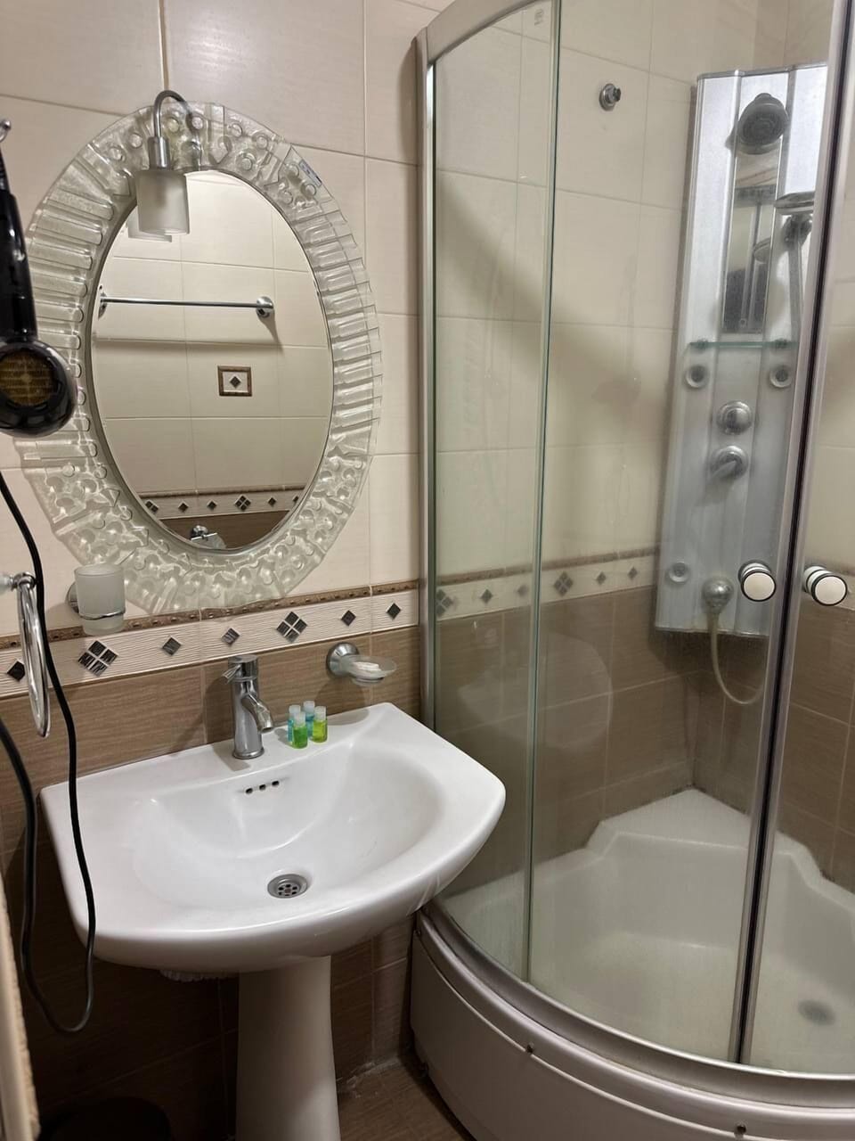 Shower, free toiletries, hair dryer, towels