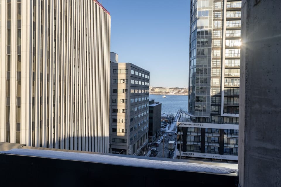 Enjoy striking cityscape and waterfront views directly from your building—offering a serene urban backdrop throughout the day