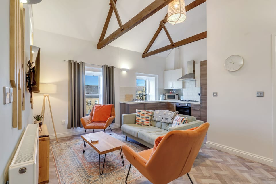 Apartment, City View | Living area | 30-inch TV with cable channels