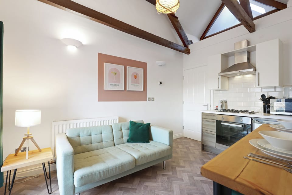 Apartment, City View | Living area | 30-inch TV with cable channels