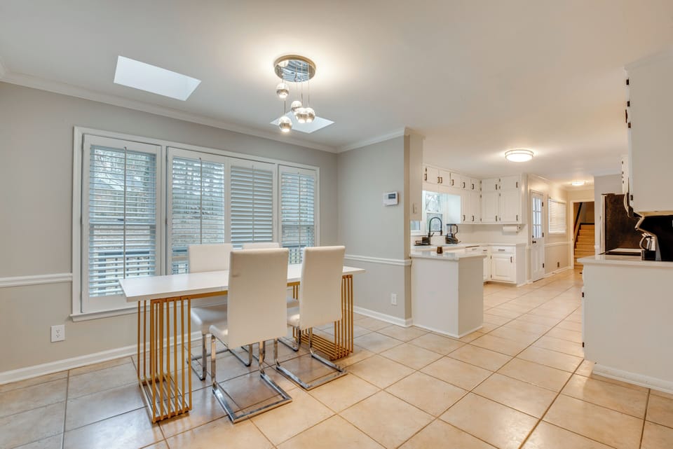 Dining Area | Dishware & Flatware | Central A/C & Heat | 1st Floor