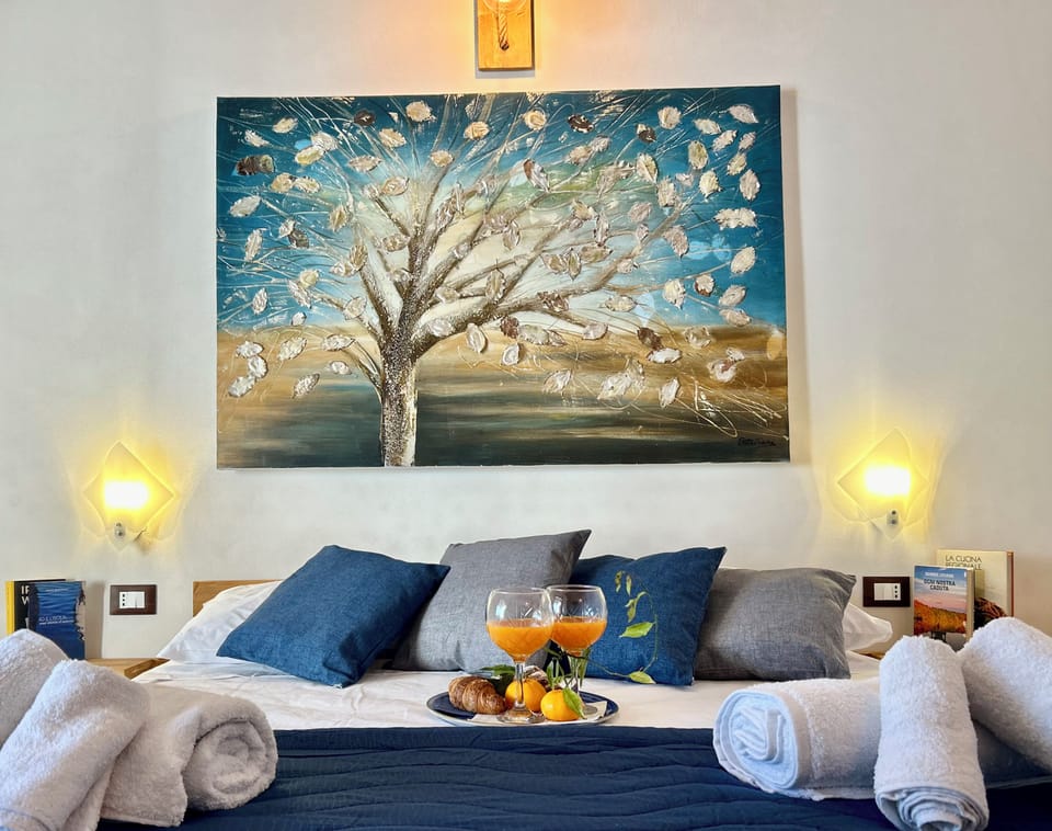 Room, City View | Minibar, individually decorated, individually furnished, desk