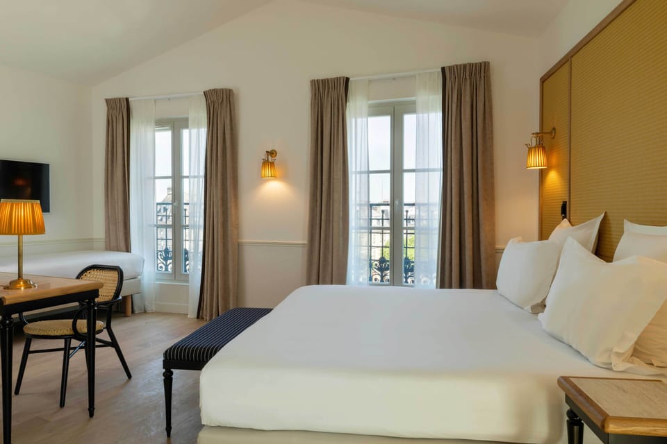 Signature Suite | Premium bedding, minibar, in-room safe, desk