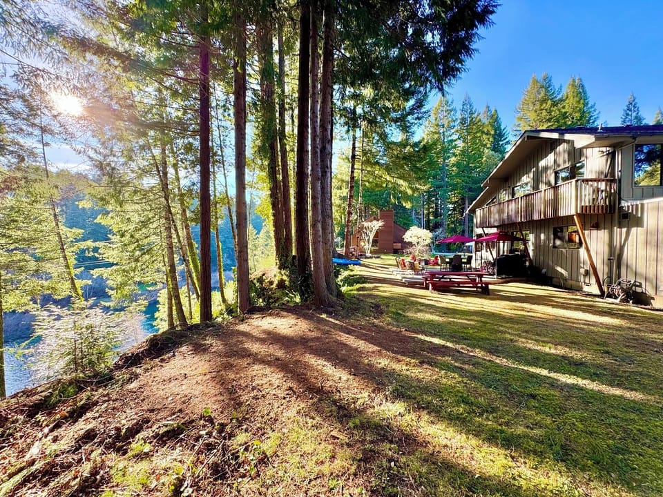 Side view of the backyard on the bank of the Smith River.