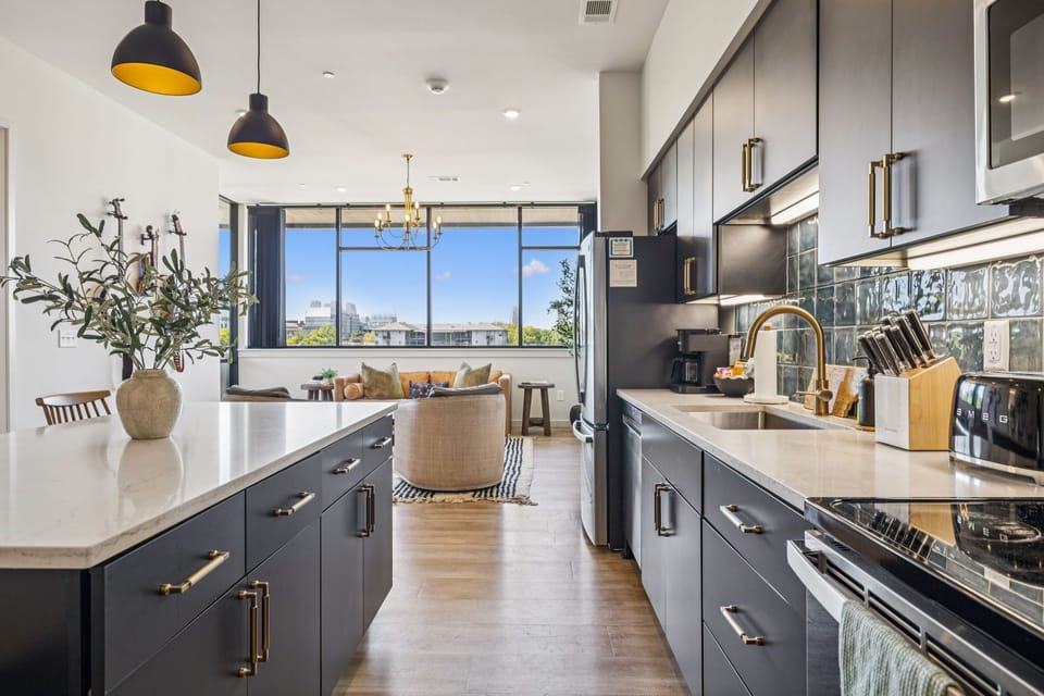 Luxury Condo, Balcony, City View | Private kitchen | Full-size fridge, microwave, oven, stovetop