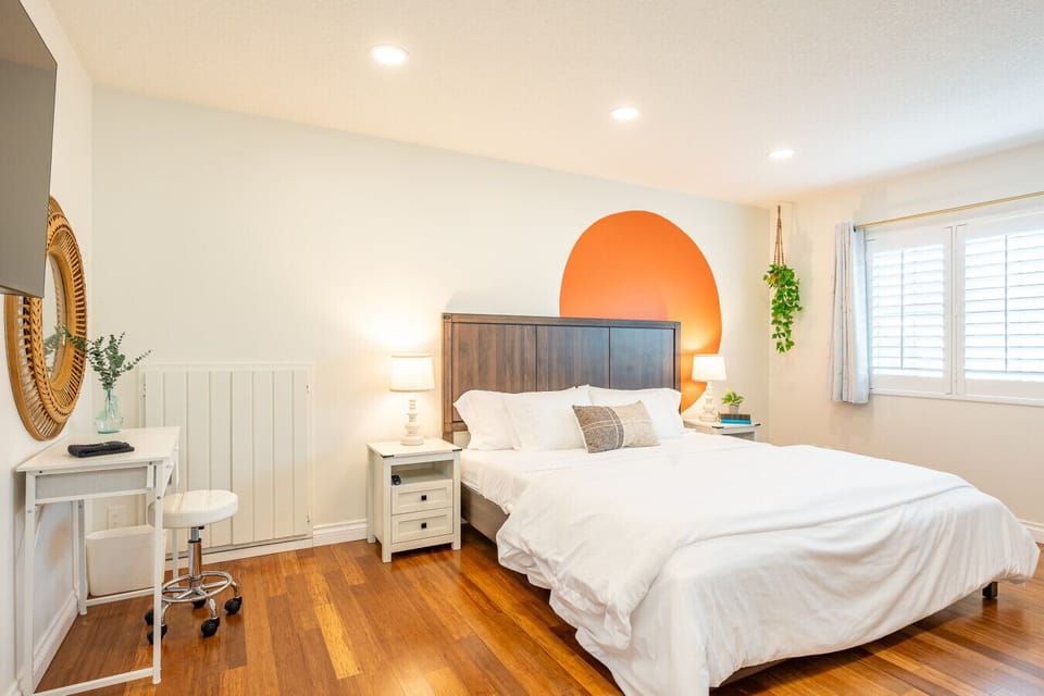 Bright, airy, and designed for comfort, this inviting bedroom is the perfect place to recharge after a day of Southern California adventures. With cozy touches, soft natural light, and space to truly unwind, restful nights come easy here.