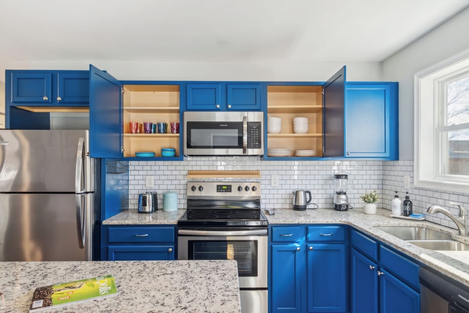 Effortlessly create meals in this fully equipped open-concept kitchen